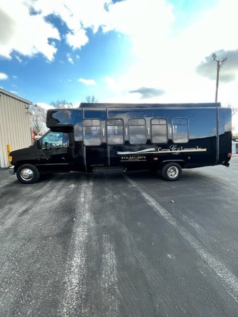 Black limo coach - Custom Limousine Kansas City